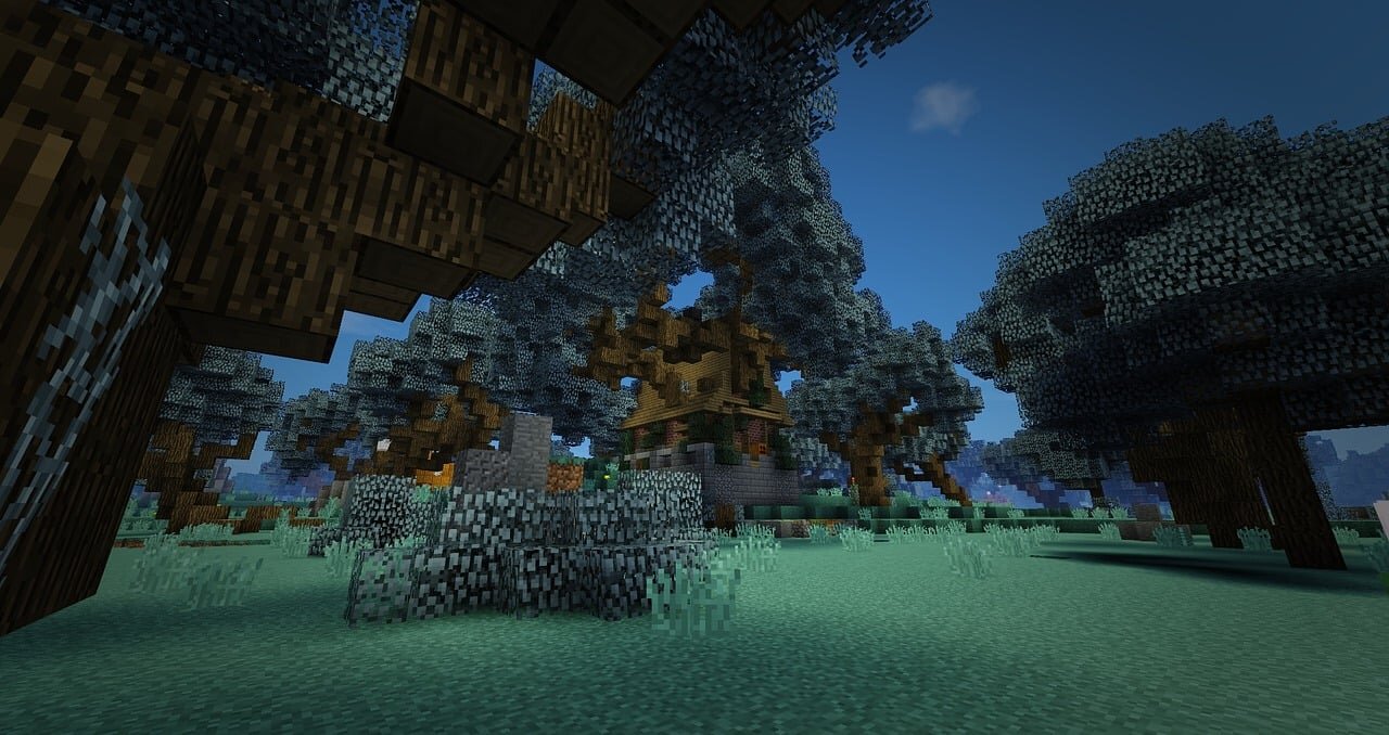 A wooden cottage nestled among tall trees in a misty Minecraft forest