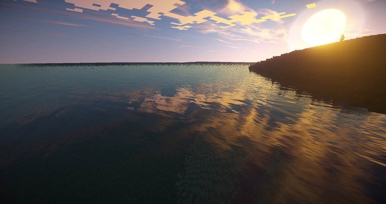 Sunlight reflecting off open water in Minecraft at sunrise